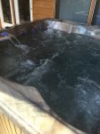 Waterfall feature and LEDs light up the hot tub